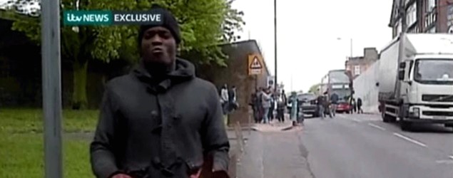 A man with bloodied hands appeared in a video immediately after a vicious attack in southwest London that left a U.K. soldier dead. (ITV News via CBS-New York)